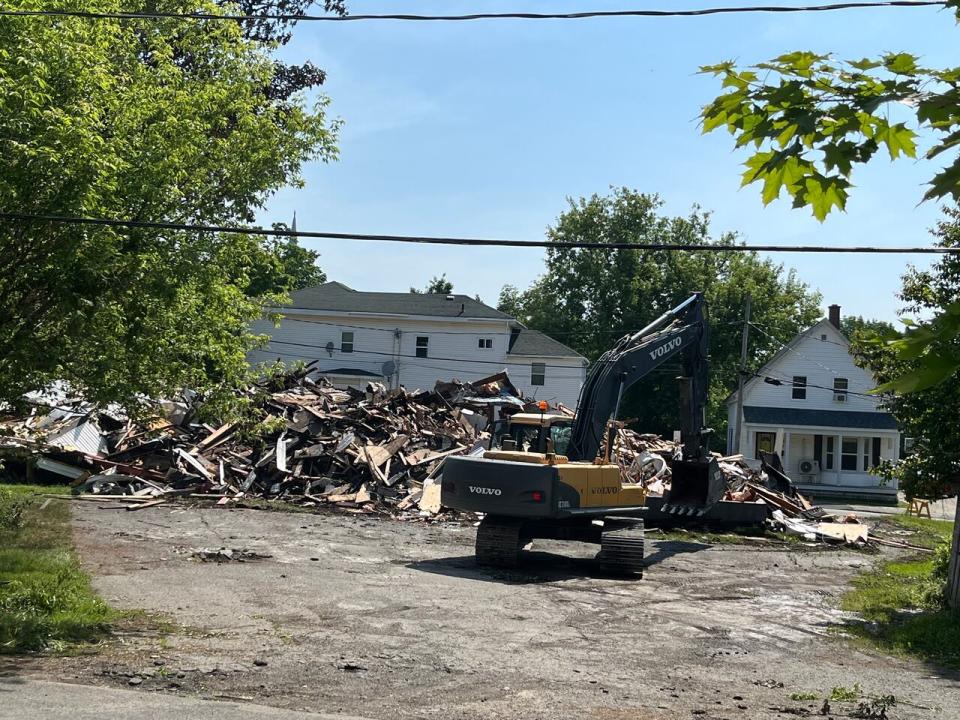 Neighbours documented the fire that tore through the building at 80 Union Street on Monday night into Tuesday morning. By late morning, the building was almost completely torn down.