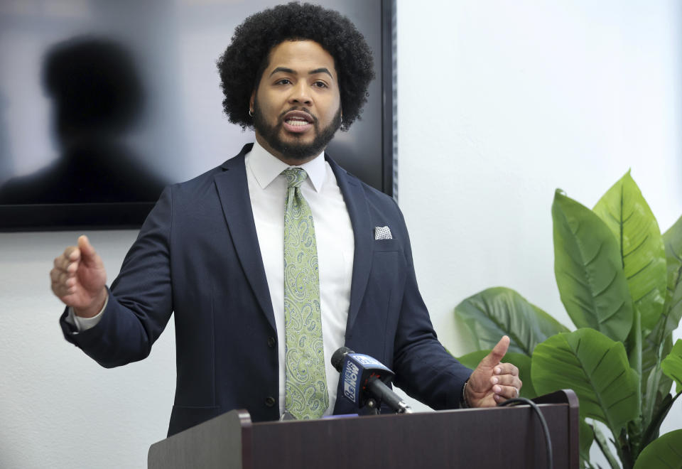 Quentin Savwoir, president of the Las Vegas branch of the NAACP, speaks during a news conference at the ACLU of Nevada offices, Friday, Jan. 19, 2024, in Las Vegas. The news conference addressed questions relating to the release of Clark County School District Police body-worn camera footage depicting a CCSD police officer tackling and kneeling on a Black teen outside a Las Vegas high school last year. (Steve Marcus/Las Vegas Sun via AP)