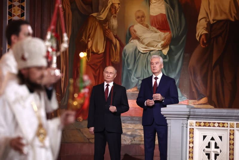 Russian President Putin attends Orthodox Easter service