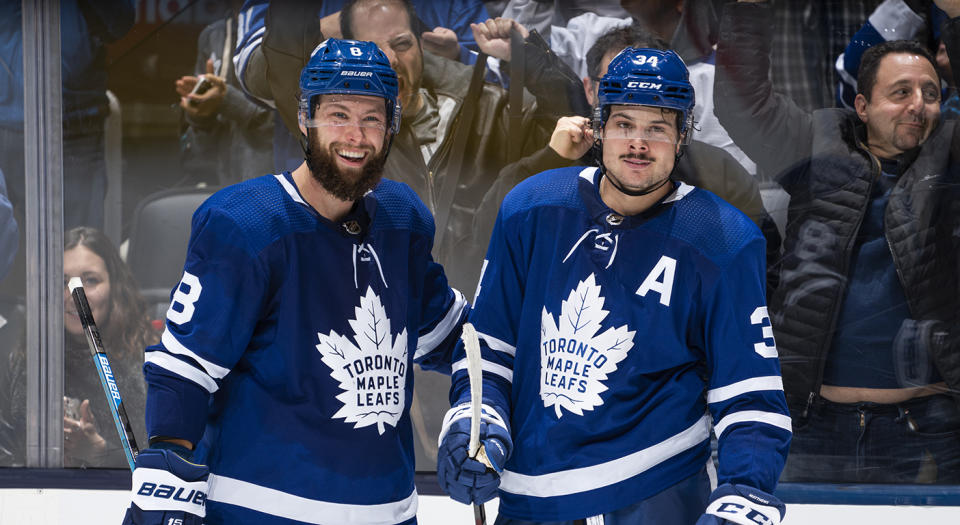 TORONTO, ON - OCTOBER 25: Auston Matthews #34 of the Toronto Maple Leafs celebrates his goal against the San Jose Sharks with teammate Jake Muzzin #8 during the third period at the Scotiabank Arena on October 25, 2019 in Toronto, Ontario, Canada. (Photo by Mark Blinch/NHLI via Getty Images)