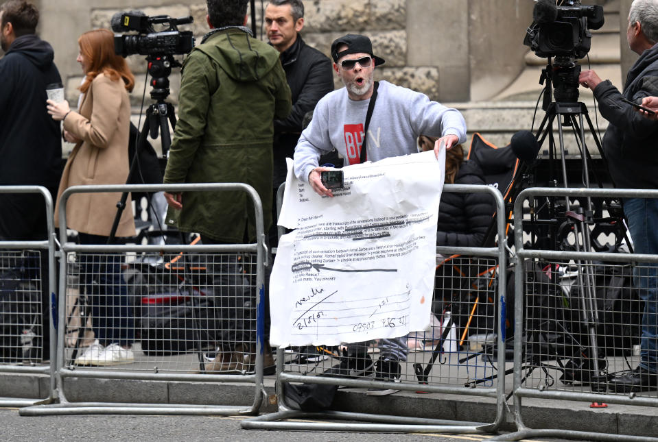 Brian Harvey, a former member of boyband East 17, protests about his own hacking case as Prince Harry, Duke of Sussex, gives evidence at the Mirror Group Phone hacking trial at the Rolls Building at High Court on June 07, 2023 in London, England. Prince Harry is one of several claimants in a lawsuit against Mirror Group Newspapers related to allegations of unlawful information gathering in previous decades. (Photo by Karwai Tang/WireImage)