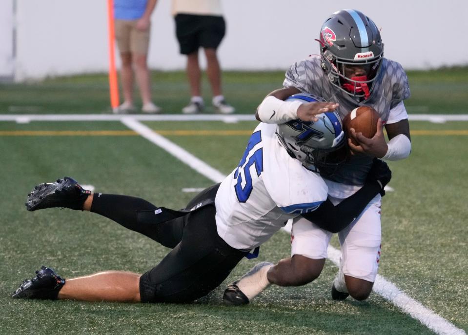 Bartram Trail linebacker Zeke Cromwell (45) makes a tackle against Daytona Beach Seabreeze in a September 2022 game.