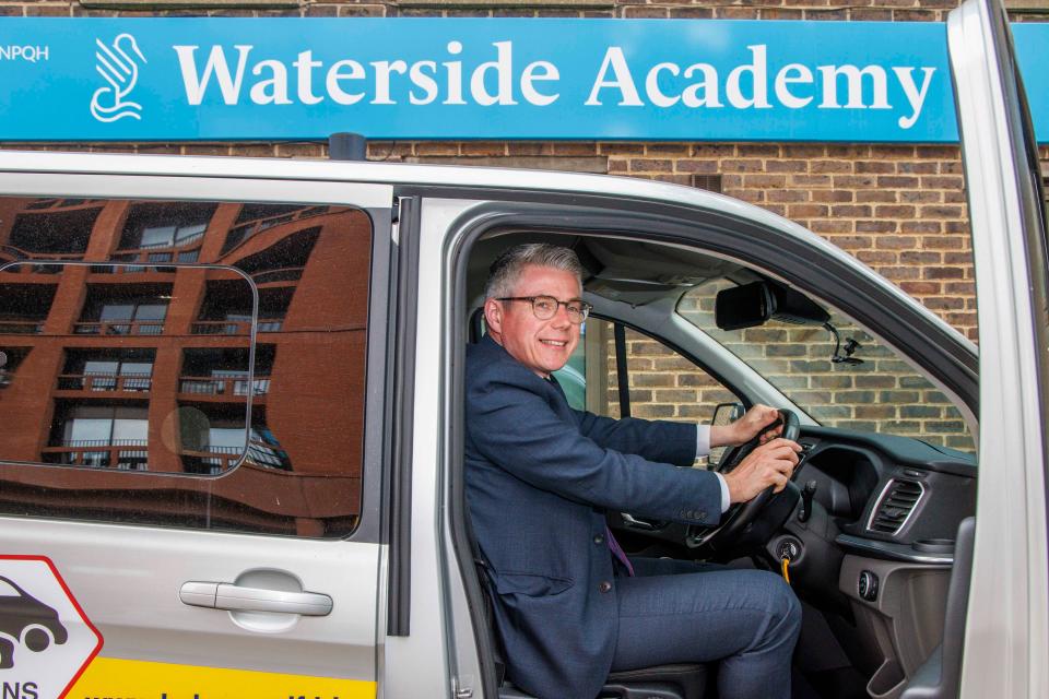 Waterside Academy headteacher Francis Bray in the bus that picks up children for their GCSE exams (Tom Barnes)