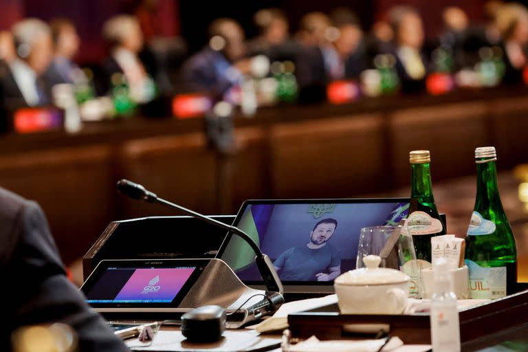 Ukraine's President Volodymyr Zelensky addresses a session virtually during the G20 Summit in Nusa Dua on the Indonesian resort island of Bali on November 16, 2022. (Photo by WILLY KURNIAWAN / POOL / AFP)