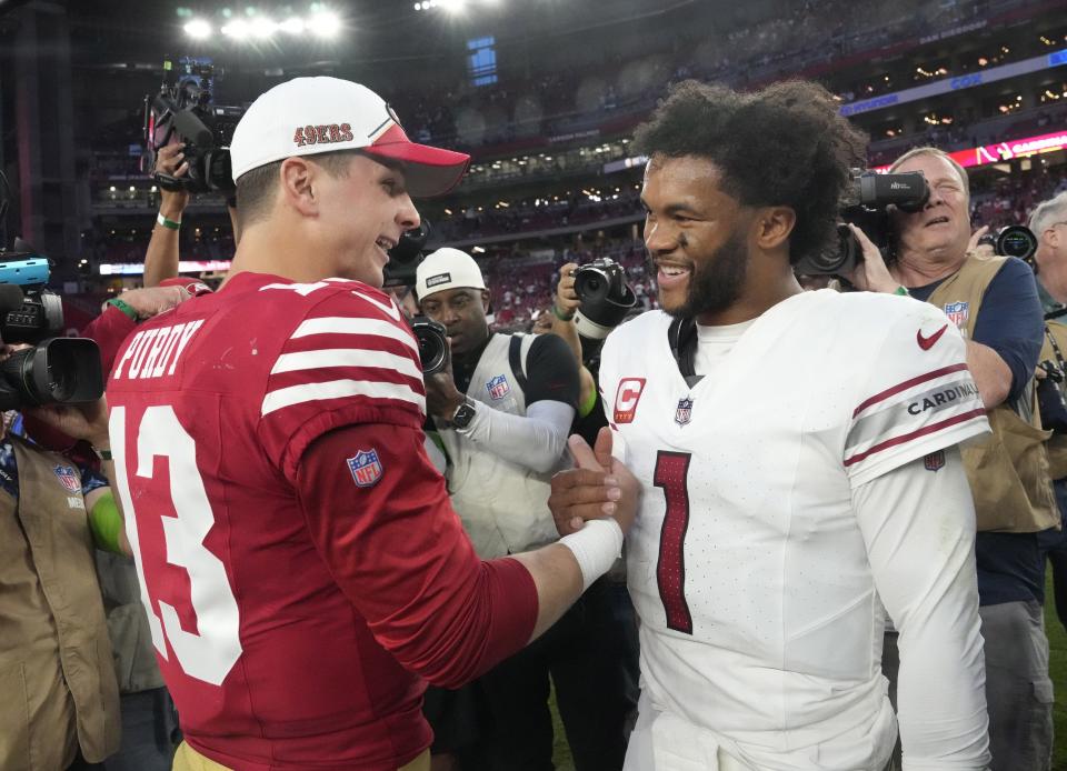 Dec 17, 2023; Glendale, Ariz, United States; Arizona Cardinals quarterback Kyler Murray (1) congratulates San Francisco 49ers quarterback Brock Purdy (13) after losing 45-22 at State Farm Stadium.