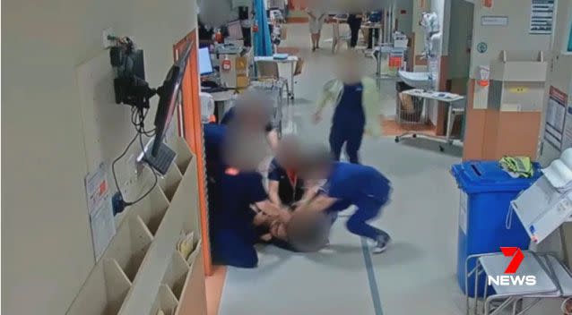 It too six hospital employees to break the chokehold and free the doctor before security guards and police swooped to arrest the man. Source: 7 News