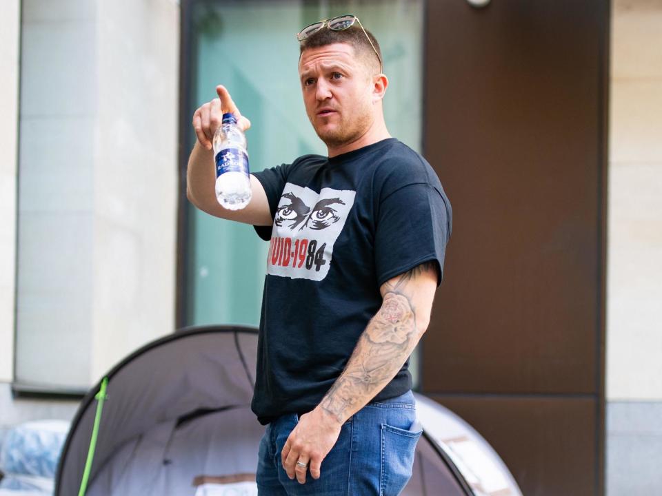 Tommy Robinson arrives at arrives at Westminster Magistrates' Court in London to support Britain First leader Paul Golding on 20 May, 2020: Aaron Chown/PA Wire