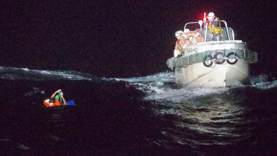 A crew member from the capsized Gulf Livestock 1 ship being rescued