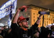 Supporters of U.S. President Donald Trump gather at a rally at Freedom Plaza in Washington