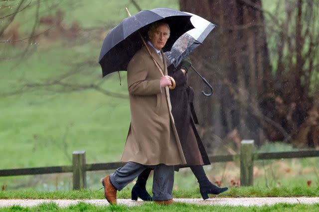<p>Max Mumby/Indigo/Getty Images</p> King Charles and Queen Camilla attend the Sunday service at the Church of St Mary Magdalene on the Sandringham estate on February 18.