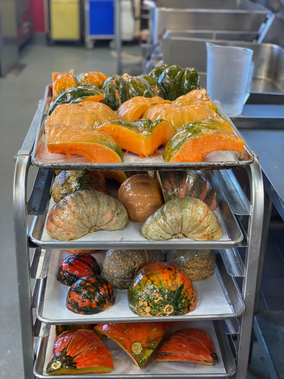 Pieces of multicolored squash sit on trays at Owamni, a Minneapolis restaurant created by the Sioux Chef to celebrate the food of the Dakota people.