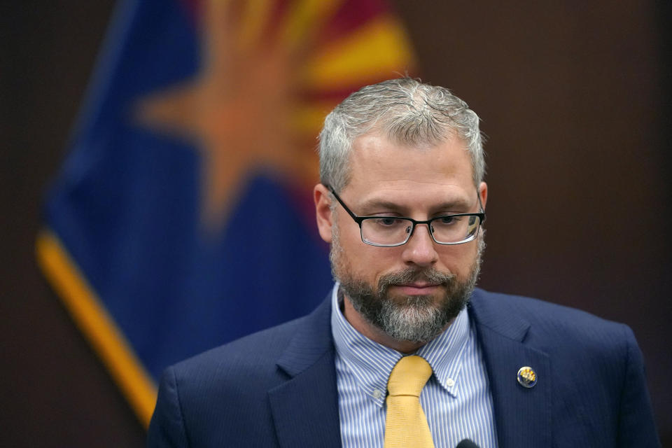 Pinal County Attorney Kent Volkmer listens to complaints while addressing election day ballot shortages in Pinal county, Wednesday, Aug. 3, 2022, in Florence, Ariz. (AP Photo/Matt York)