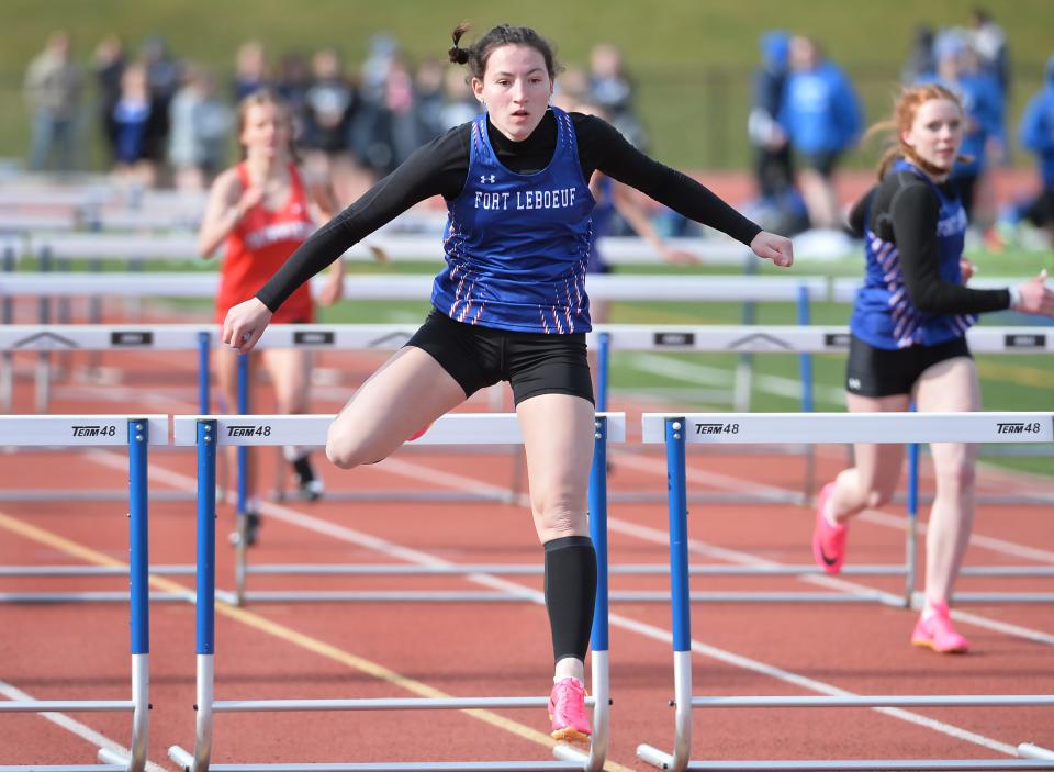 Fort LeBoeuf junior Ella Corritore wins the 100-meter hurdle race during a dual track meet with Fairview in Waterford on March 28.