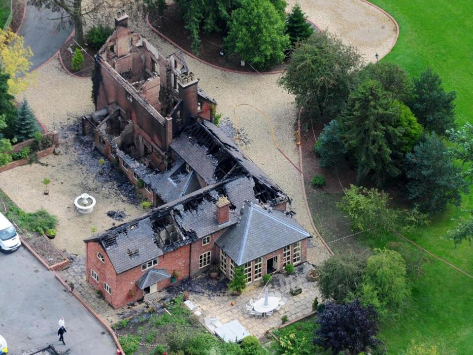 The Shropshire estate at which in 2008 a millionaire with business problems murdered his wife and daughter before shooting dead their dogs and horses, setting fire to the house, and finally killing himself (PA)