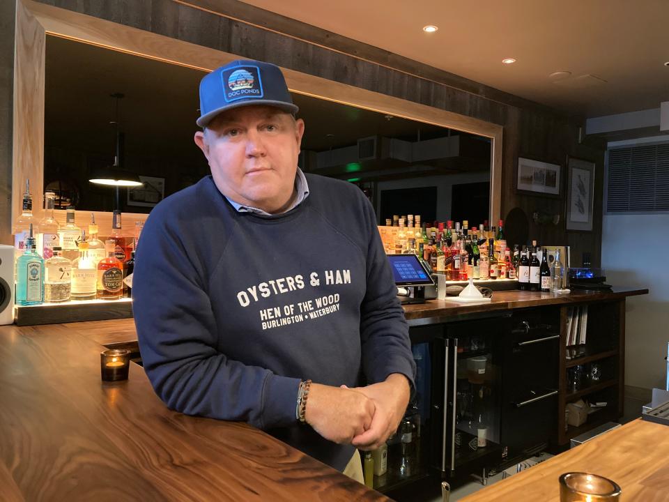Hen of the Wood owner Eric Warnstedt stands at the downstairs bar at the Waterbury restaurant on June 29, 2023.