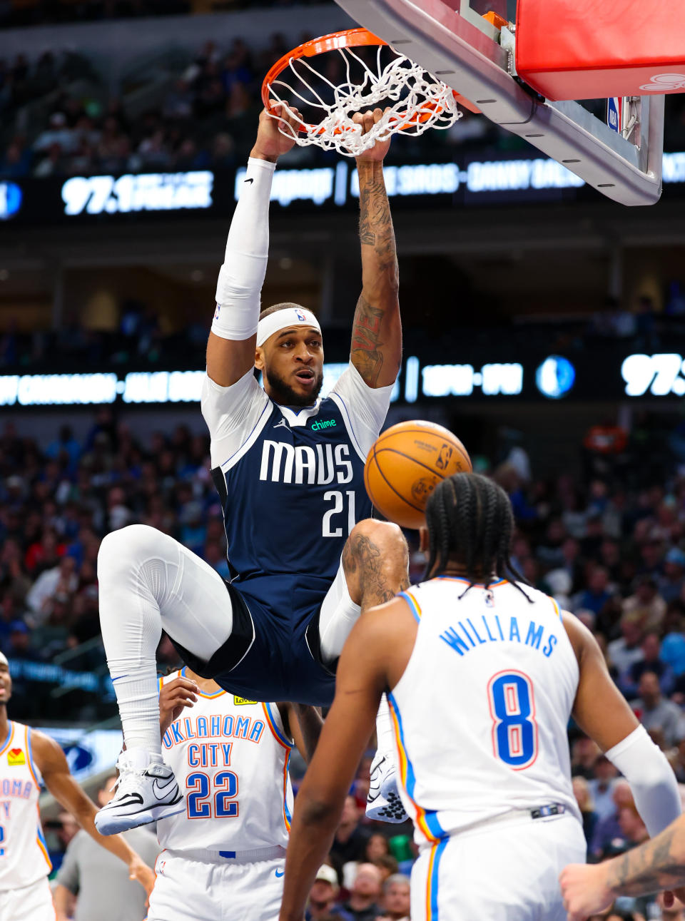 Feb 10, 2024; Dallas, Texas, USA; Dallas Mavericks center Daniel Gafford (21) dunks over Oklahoma City Thunder forward Jalen Williams (8) during the second half at American Airlines Center. Mandatory Credit: Kevin Jairaj-USA TODAY Sports