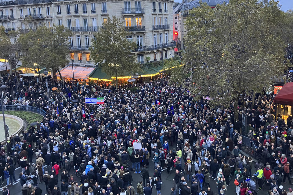 Thousands gather for a march against antisemitism in Paris, France, Sunday, Nov. 12, 2023. French authorities have registered more than 1,000 acts against Jews around the country in a month since the conflict in the Middle East began. (AP Photo/Sylvie Corbet)