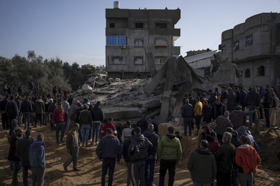 Palestinians search for bodies and survivors in the rubble of a residential building destroyed in an Israeli airstrike in Rafah, Gaza Strip, Monday, March 4, 2024. (AP Photo/Fatima Shbair)