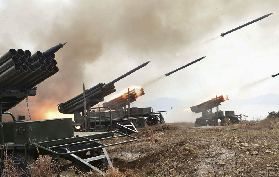 <p>A view of artillery fire and landing exercises guided by North Korean leader Kim Jong Un in this undated photo. (KCNA/Reuters) </p>