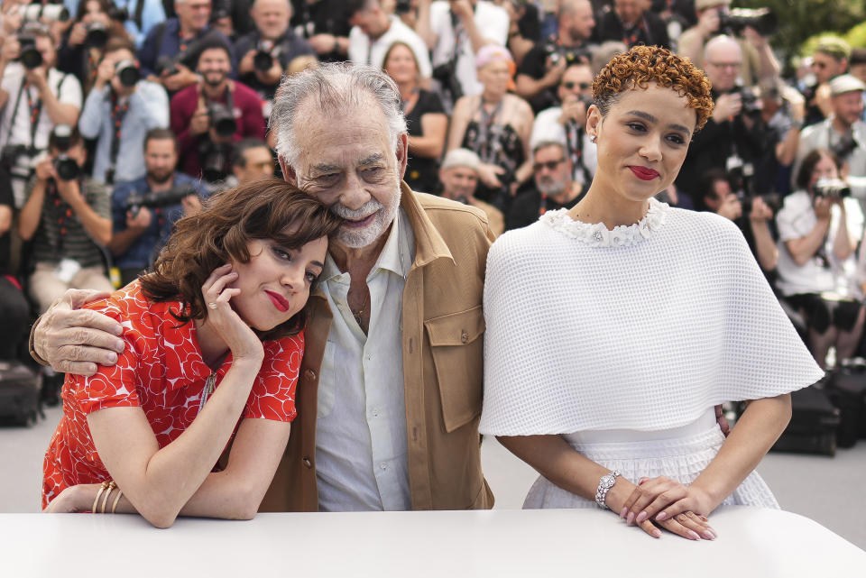 Aubrey Plaza, from left, director Francis Ford Coppola, and Nathalie Emmanuel pose for photographers at the photo call for the film 'Megalopolis' at the 77th international film festival, Cannes, southern France, Friday, May 17, 2024. (Photo by Scott A Garfitt/Invision/AP)