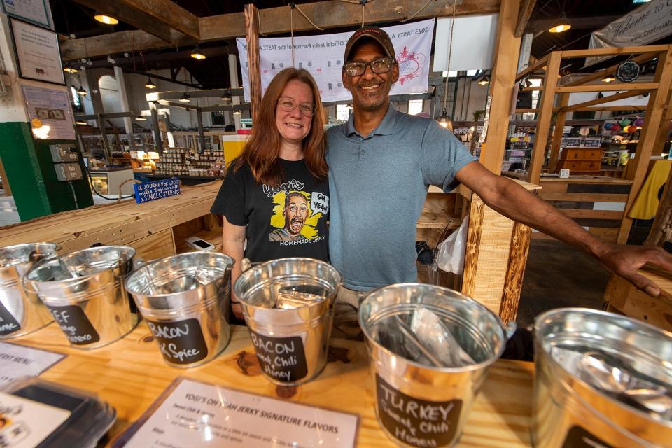 Bev, left, and Chris, aka Yogi, Awkward at their stand Yogi's Oh Yeah Jerky at Central Market in York.