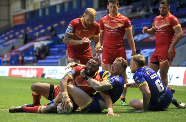 Catalans Dragons’ Samisoni Langi scores a try