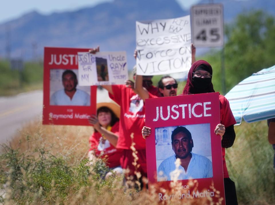 People gather outside of the Ajo Border Patrol Station to protest the fatal Border Patrol shooting of Raymond Mattia, a Tohono O'odham Nation member who was killed on May 18, 2023, near Ajo, Arizona.