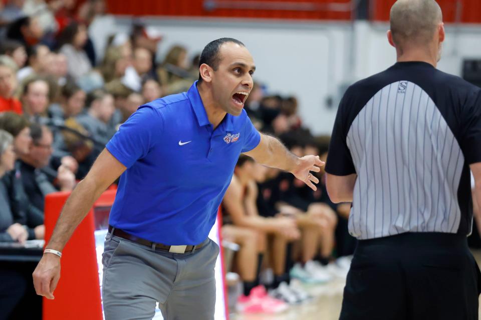 Oklahoma Christian School's coach Brandon Weaver shouts at an official during a boys high school basketball game between North Rock Creek and Oklahoma Christian School in Edmond, Okla., Tuesday, Jan. 9, 2024.