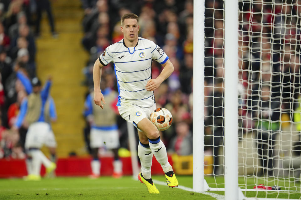 Atalanta's Mario Pasalic celebrates scoring his side's 3rd goal during the Europa League quarter final first leg soccer match between Liverpool and Atalanta, at the Anfield stadium in Liverpool, England, Thursday, April 11, 2024. (AP Photo/Jon Super)