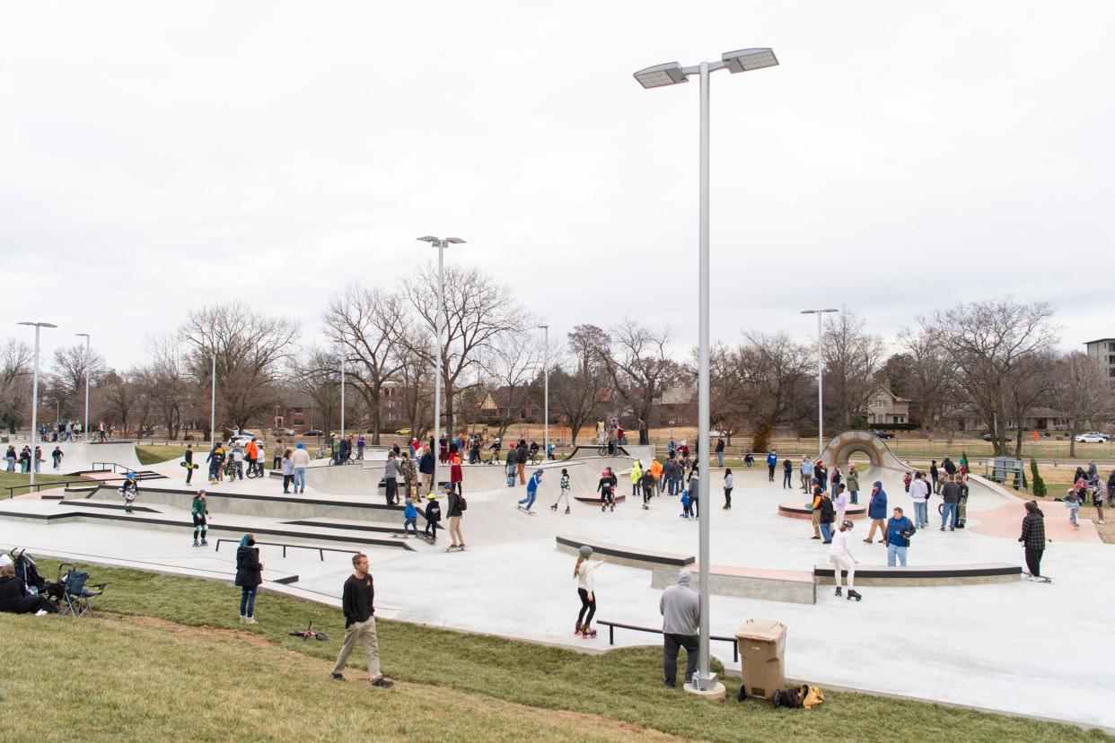 Skates, skateboards, bikes and scooters fill the park during the grand opening of Sunset Skatepark in Downtown Evansville, Ind., Saturday, Dec. 16, 2023.