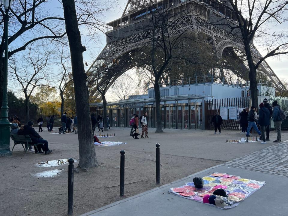 There were lots of street vendors selling Eiffel Tower replicas.