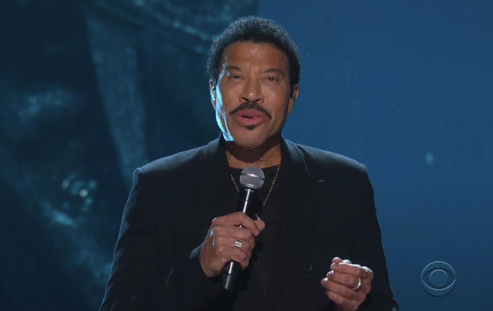 In this video grab provided by CBS and the Recording Academy, Lionel Richie performs during the In Memoriam at the 63rd annual Grammy Awards at the Los Angeles Convention Center on Sunday, March 14, 2021. (CBS/Recording Academy via AP)