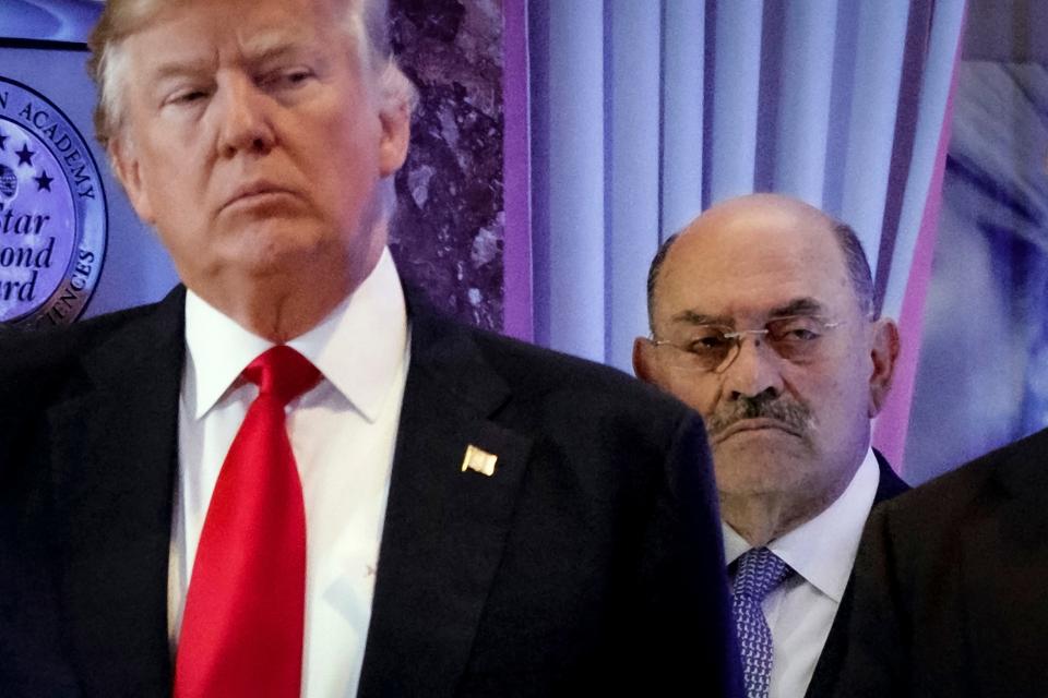 Allen Weisselberg, right, stands behind then President-elect Donald Trump during a news conference in the lobby of Trump Tower in New York, on Jan. 11, 2017. The judge in Donald Trump’s civil fraud trial is demanding more information after Weisselberg, a key witness, was reported to be in negotiations to plead guilty to perjury in connection with his testimony in the lawsuit.