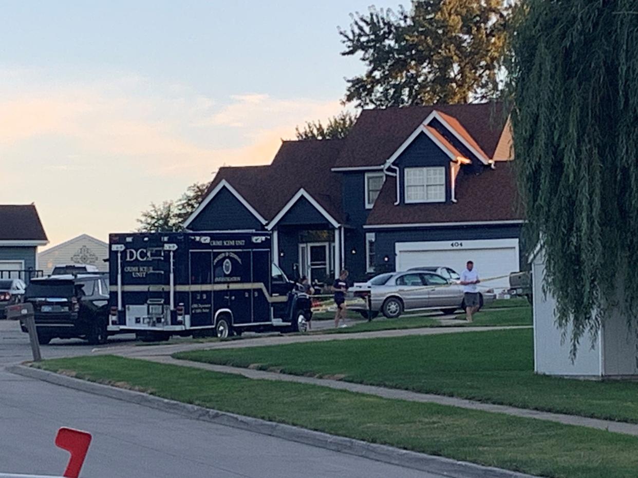 Officers from Pleasant Hill Police and the Iowa Division of Criminal Investigation continue their investigation after Pleasant Hill Police, responding to a report of gunshots being fired, shot and killed an armed man Saturday afternoon.
(Credit: Kevin Baskins/Des Moines Register