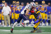 <p>John Johnson III #43 of the Los Angeles Rams tackles Julian Edelman #11 of the New England Patriots in the second half during Super Bowl LIII at Mercedes-Benz Stadium on February 3, 2019 in Atlanta, Georgia. (Photo by Kevin C. Cox/Getty Images </p>