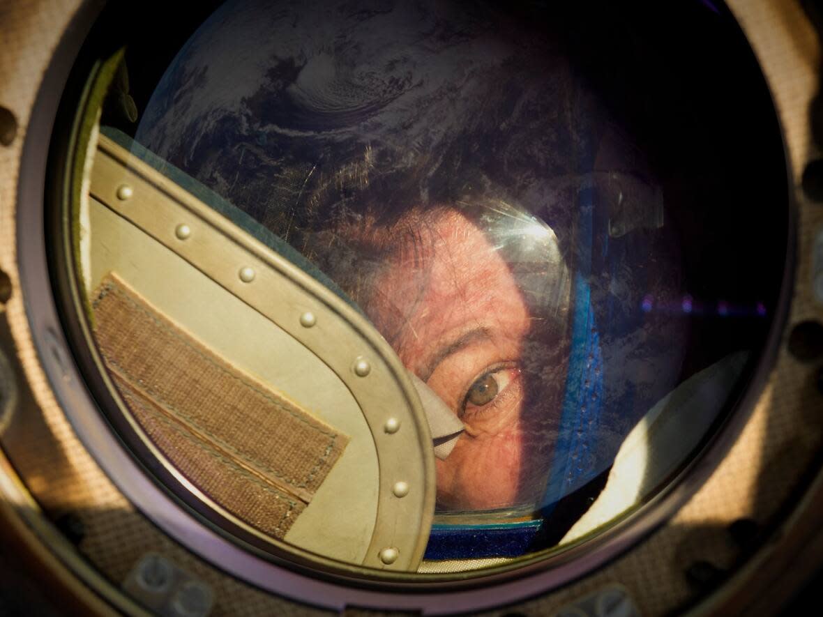 Expedition 27 Flight Engineer Cady Coleman peeks out of a window of the Soyuz TMA-20 spacecraft. She's one of the featured astronauts in The Longest Goodbye, one of the more than 200 documentaries screening at this year's Hot Docs Festival. It is also one of the very best documentaries available to stream from anywhere in Canada.  (Bill Ingalls/NASA - image credit)