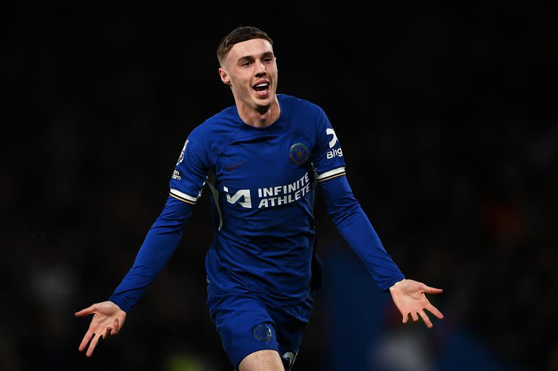 Cole Palmer of Chelsea celebrates scoring his team's first goal during the Premier League match between Chelsea FC and Everton FC at Stamford Bridge on April 15, 2024