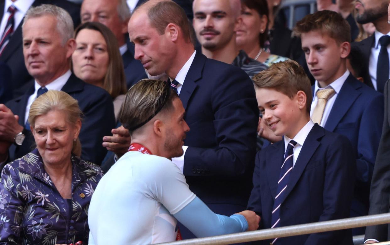 Prince George shakes Jack Grealish's hand at the FA Cup final