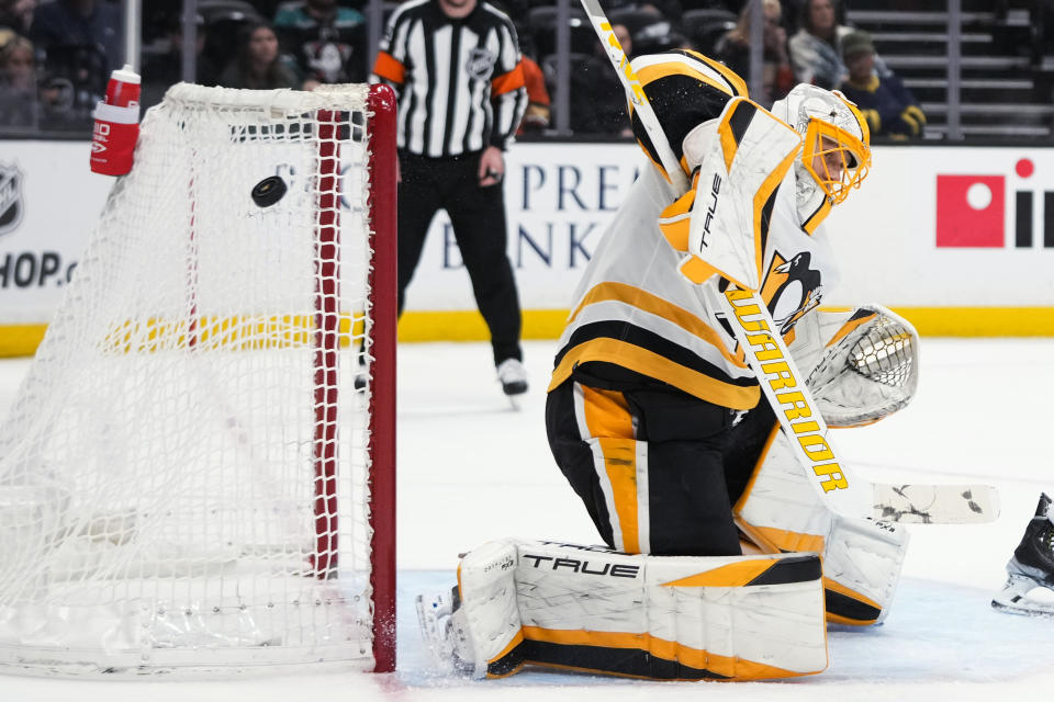 Pittsburgh Penguins goaltender Casey DeSmith deflects the puck during the third period of the team's NHL hockey game against the Anaheim Ducks on Friday, Feb. 10, 2023, in Anaheim, Calif. The Penguins won 6-3. (AP Photo/Jae C. Hong)