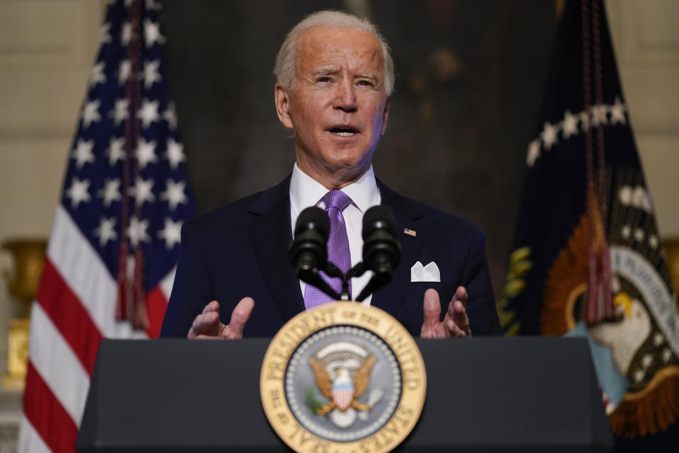 President Joe Biden delivers remarks on COVID-19, in the State Dining Room of the White House, Tuesday, Jan. 26, 2021, in Washington. (AP Photo/Evan Vucci)