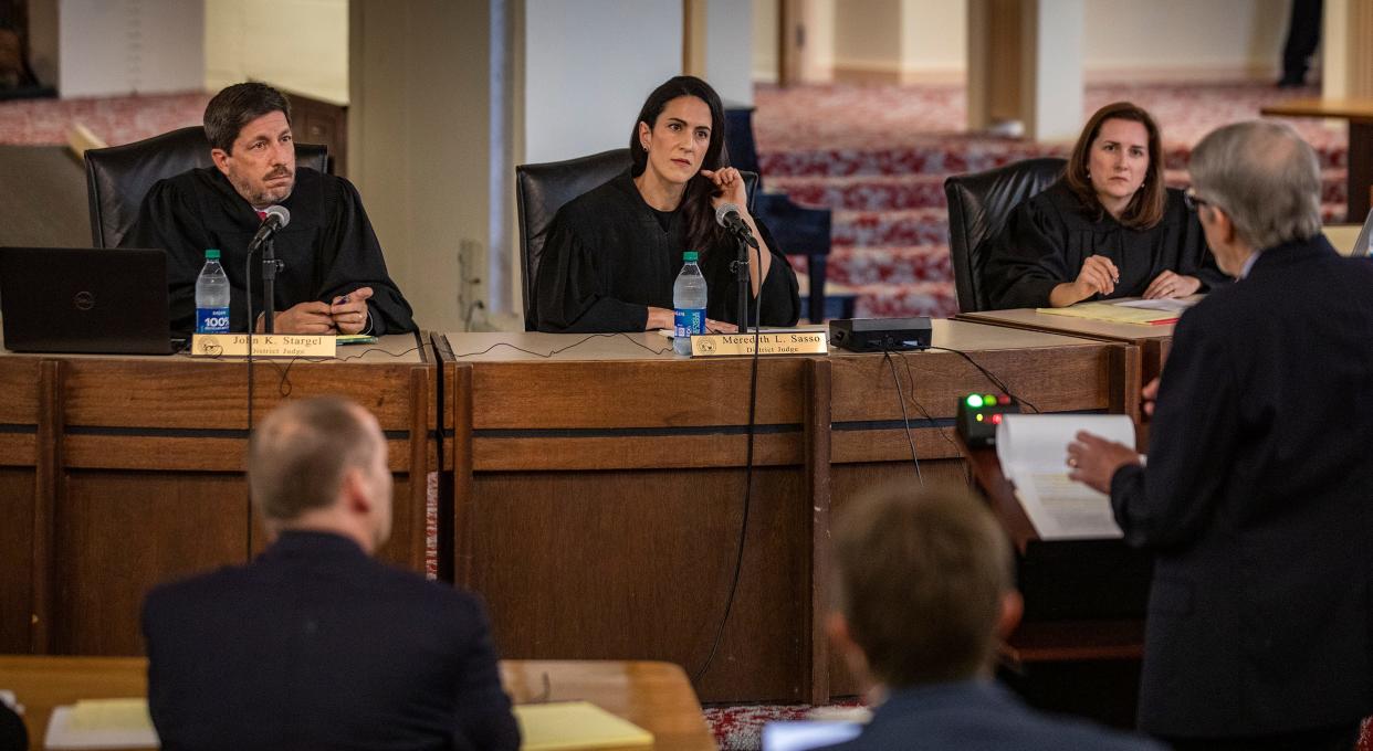 Judge Meredith Sasso, center, and Judge John Stargel, left, with the Sixth District Court of Appeal in Lakeland, are among six finalists for an opening on the Florida Supreme Court.