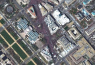 <p>This satellite image provided by DigitalGlobe captured at 11:59 a.m. EDT by DigitalGlobe’s WorldView-2 satellite on Saturday, March 24, 2018, shows downtown Washington and the site of the “March for Our Lives” rally for gun control. The stage is near the bottom right center of the image and Pennsylvania Avenue runs westward toward the top of the image. (DigitalGlobe via AP) </p>