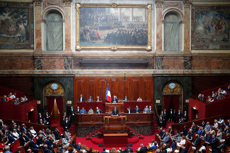 French President Emmanuel Macron addresses both the upper and lower houses of the French parliament at a special session in Versailles, near Paris, France July 9, 2018. Thibault Camus/Pool via Reuters