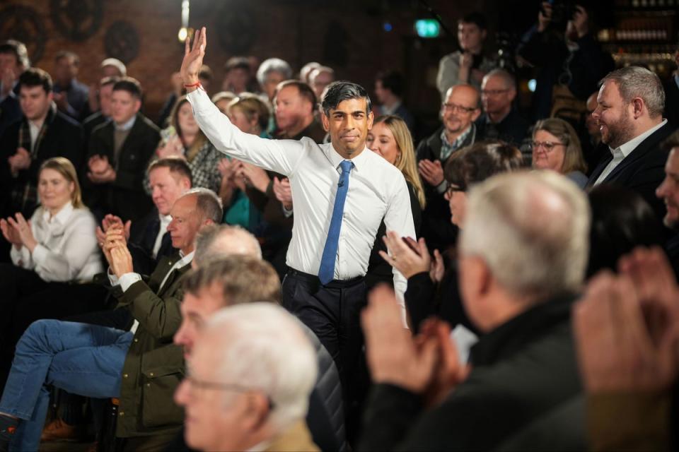 Prime Minister Rishi Sunak waves following a PM Connect event in Accrington, Lancashire (PA)