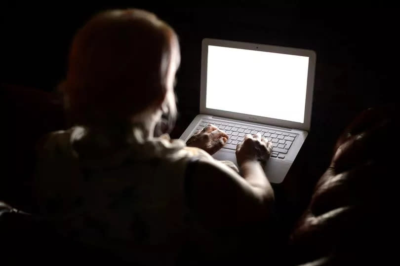 A woman using a laptop