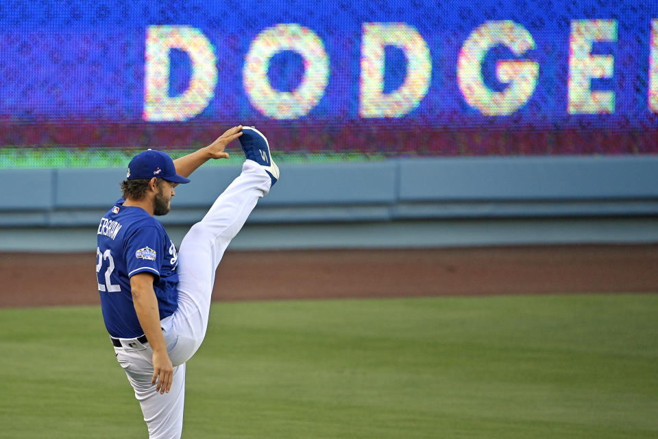 Los Angeles Dodgers starting pitcher Clayton Kershaw stretches during baseball training for the team Monday, July 6, 2020, in Los Angeles. (AP Photo/Mark J. Terrill)