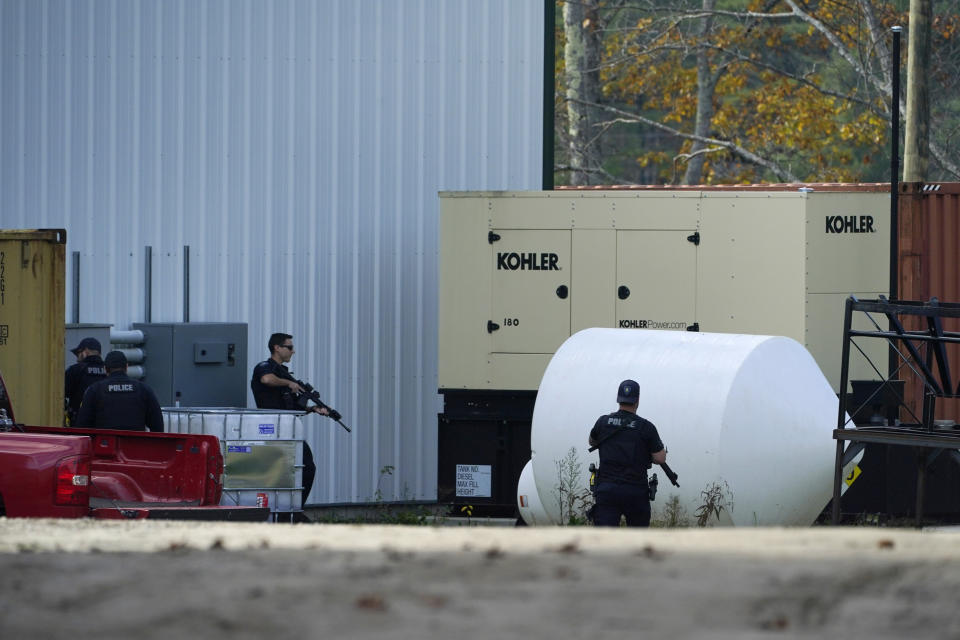 FILE - Law enforcement search a farm for the suspect in a deadly mass shootings, Friday, Oct. 27, 2023, in Lisbon, Maine. Thousands of pages Maine State Police documents released Friday, June 7, 2023, include detailed descriptions of the chaos and carnage surrounding the state’s deadliest mass shooting. (AP Photo/Robert F. Bukaty File)