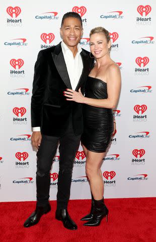 <p>Jesse Grant/Getty </p> T.J. Holmes and Amy Robach attend iHeartRadio's Jingle Ball 2023