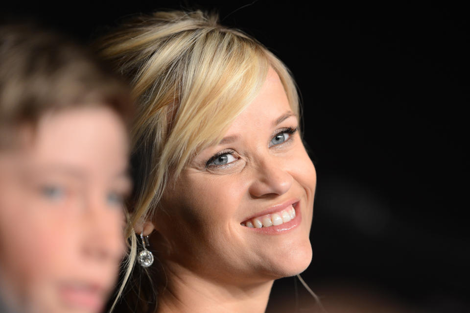 US actress Reese Witherspoon smiles during the press conference for the film 'Mud' presented in competition at the 65th Cannes film festival on May 26, 2012 in Cannes. AFP PHOTO / ANNE-CHRISTINE POUJOULAT 