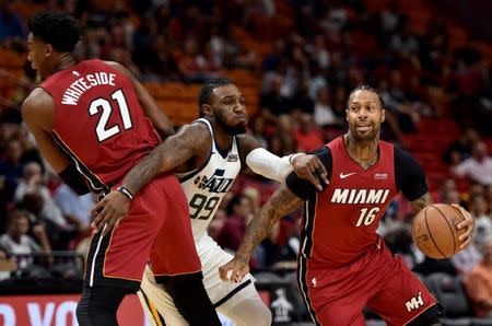 Dec 2, 2018; Miami, FL, USA; Utah Jazz forward Jae Crowder (99) is blocked by Miami Heat center Hassan Whiteside (21) as Miami Heat forward James Johnson (16) dribbles the ball during the first half at American Airlines Arena. Mandatory Credit: Steve Mitchell-USA TODAY Sports